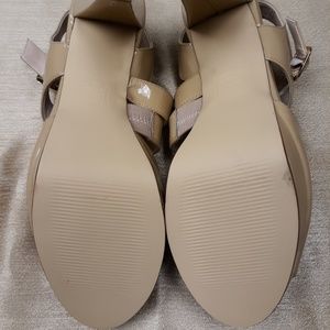 Nude color, Patent leather upper, strappy heel.